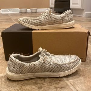 Hey dudes. Size 7. White and Grey. Slightly worn.